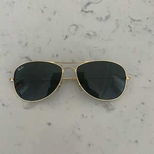 Gold and green Rayban aviators